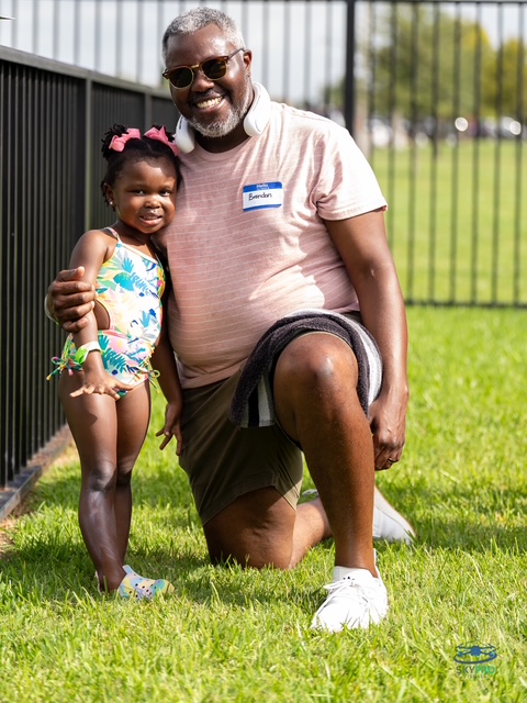 Grandfather and granddaughter at a DSSC event